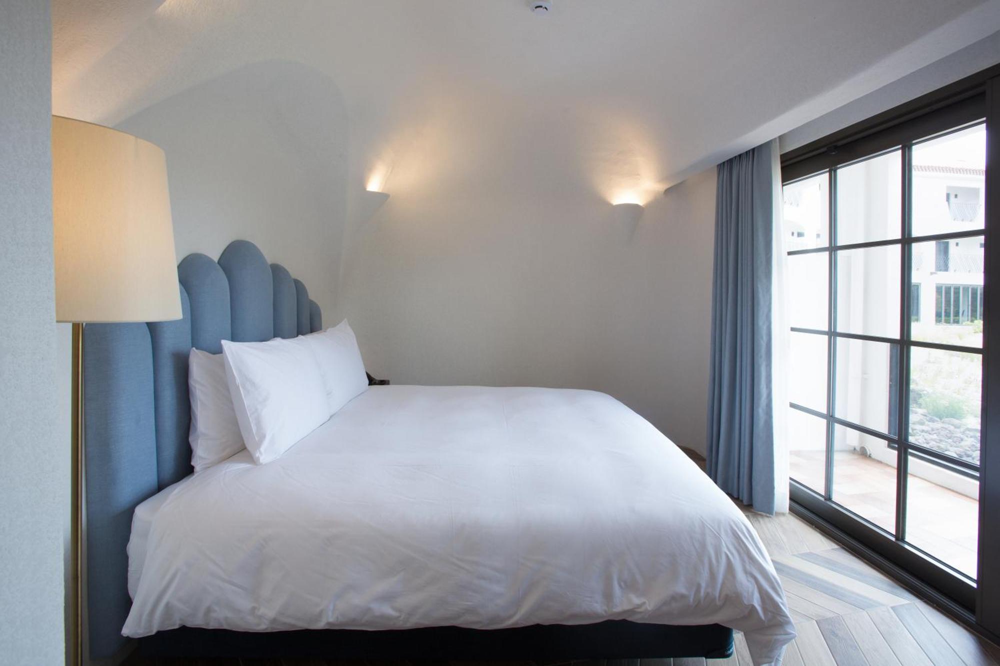 Ecoland Hotel Чеджудо Экстерьер фото