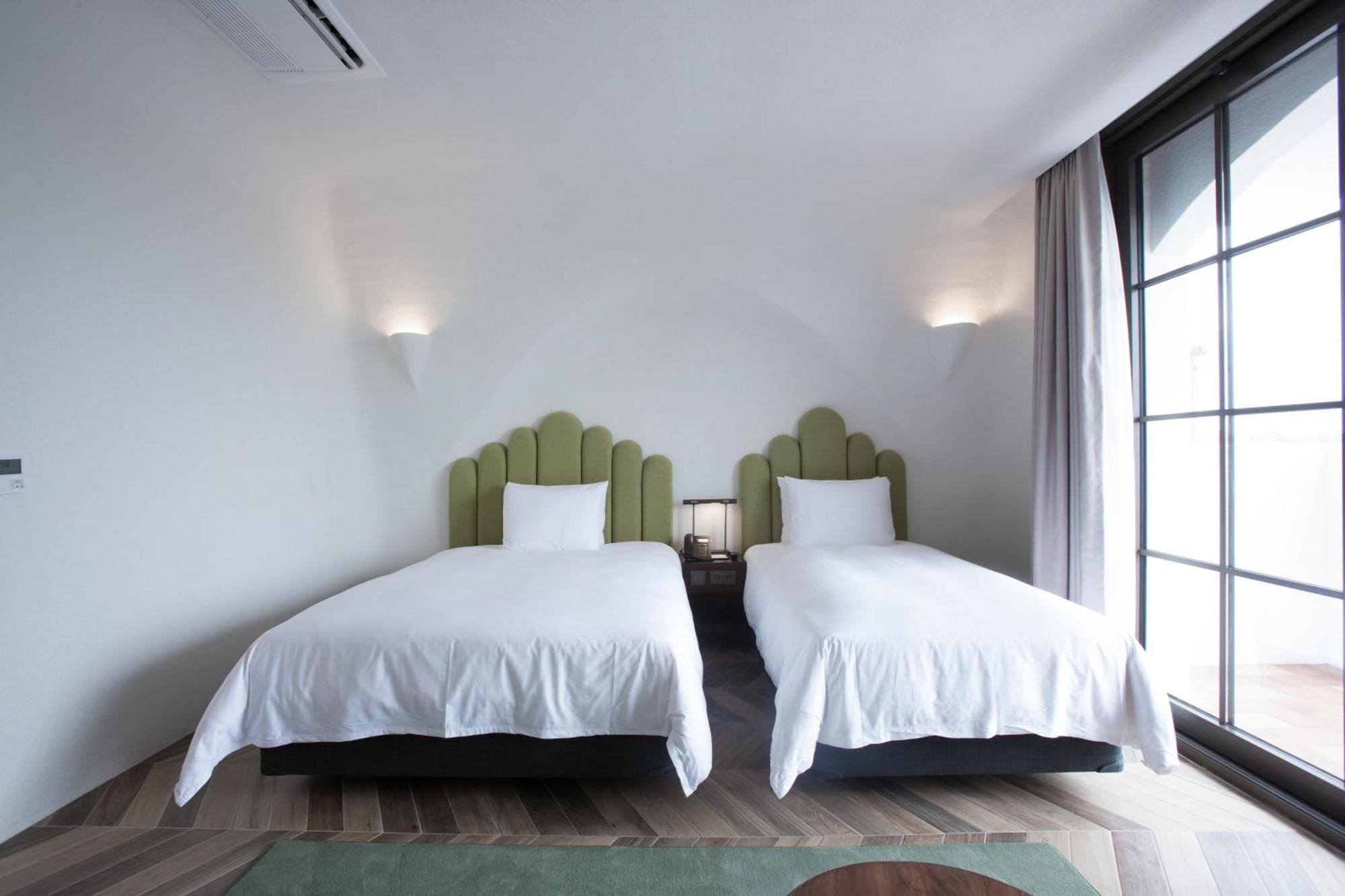 Ecoland Hotel Чеджудо Экстерьер фото