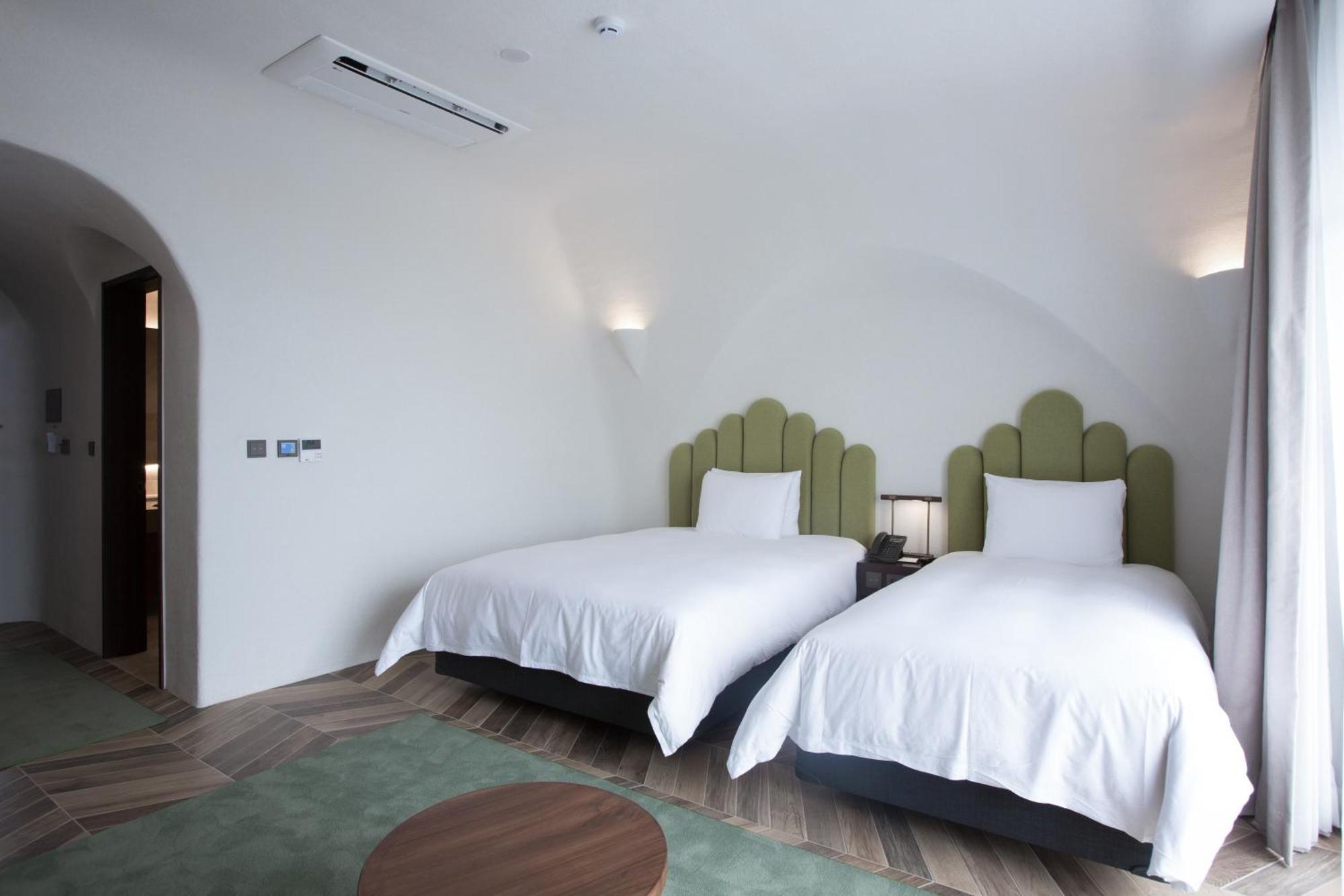 Ecoland Hotel Чеджудо Экстерьер фото