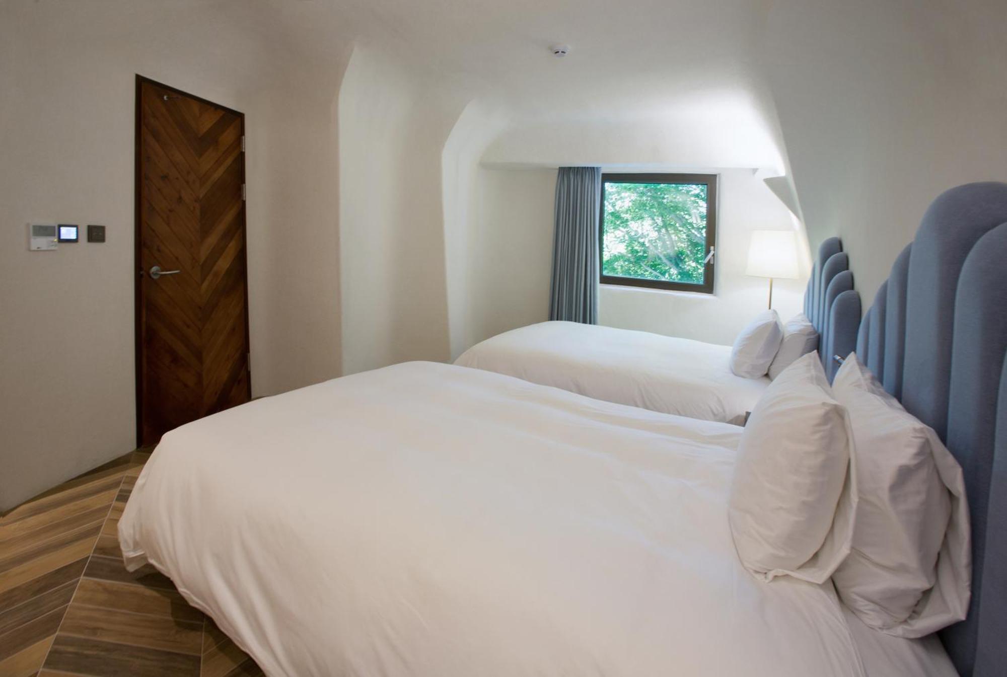 Ecoland Hotel Чеджудо Экстерьер фото